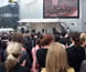 Photograph of crowds watching Sorry Day at Federation Square.