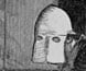 An engraving of two prisoners wearing hoods with slits for eyes. An engraving of two prisoners wearing hoods with slits for eyes.