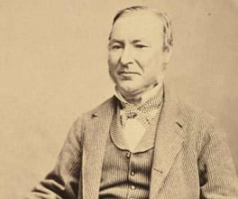 Portrait photograph of Angus McMillan.