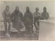 Photograph of explorers from the Australasian Antarctic Expedition (AAE), on board ship.