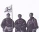 Photograph of Mawson and party at the magnetic south pole.