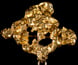 A brooch in the form of a gold nugget. A brooch in the form of a gold nugget.