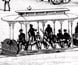 Etching of an elaborate hotel building. Etching of an elaborate hotel building.