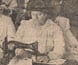 Photograph of a charitable group knitting socks for soldiers in World War I.