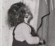 Photograph of a woman preparing for blackout, 1942. Photograph of a woman preparing for blackout, 1942.