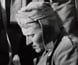 Photograph of an Australian soldier tending to a prisoner at Tobruk. Photograph of an Australian soldier tending to a prisoner at Tobruk.